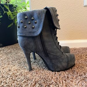 Grey booties with metal studs and lace up detail